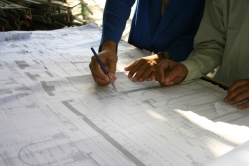 Architect accountant going over plans